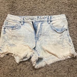 High waisted, light washed jean shorts with frayed bottom!